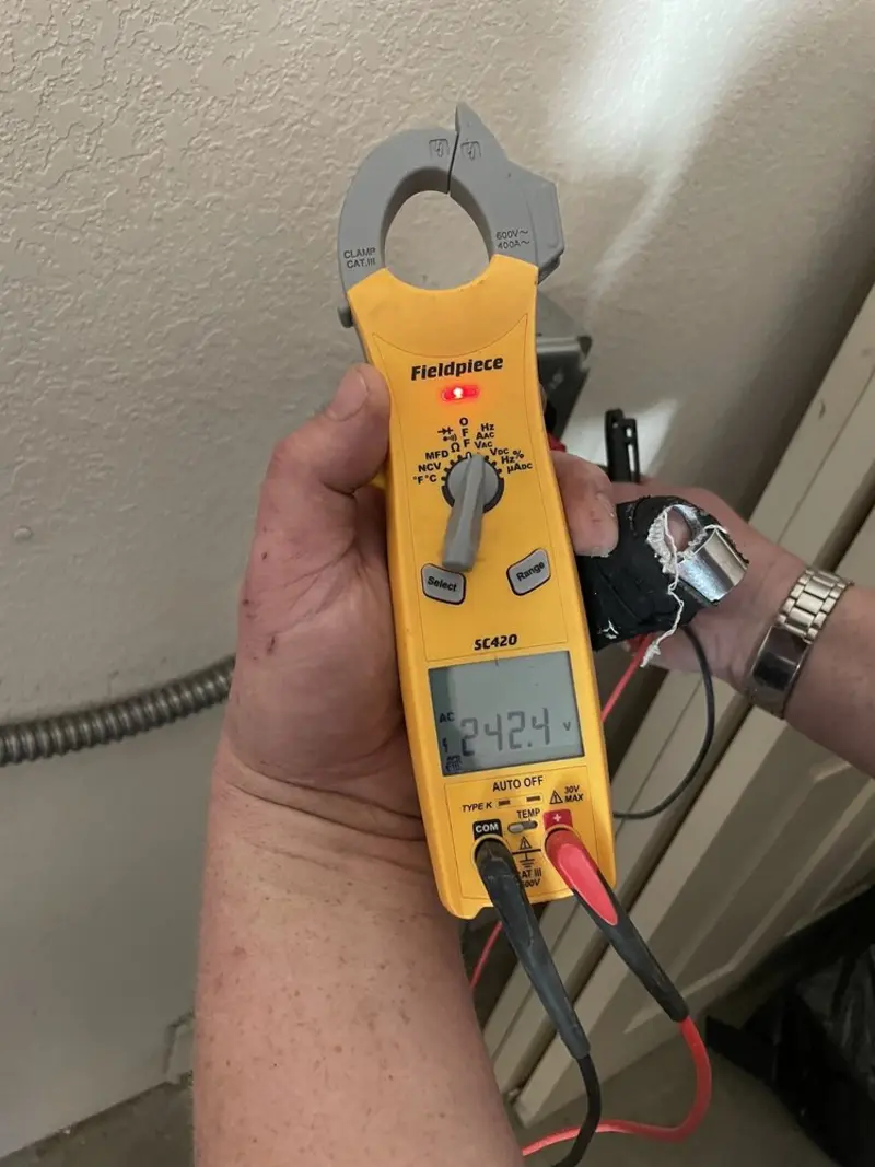 Voltage testing with clamp meter during Generator Installation in Hickman